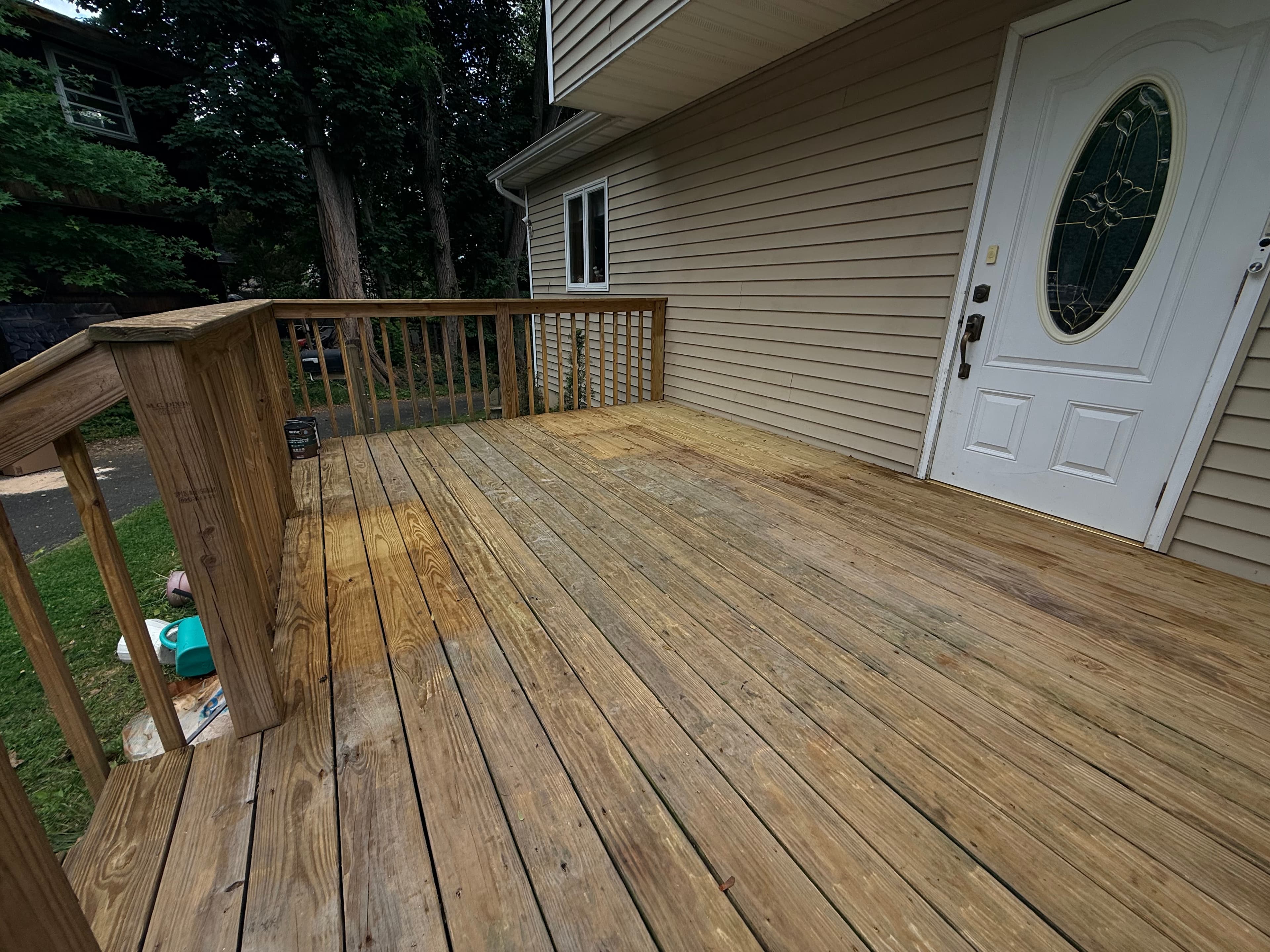General — Pressure Wash and Stain 150 sq ft Deck