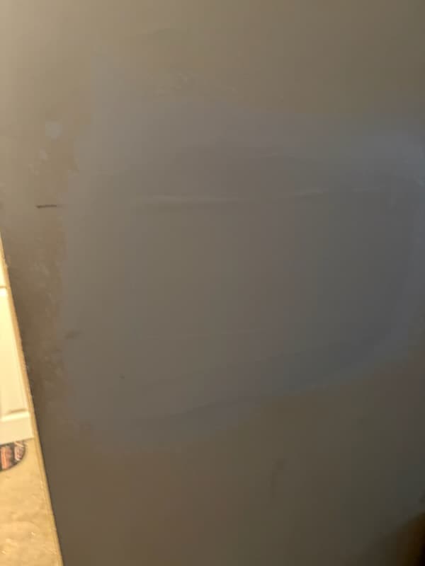 During: installing the new privacy knob on the bathroom door