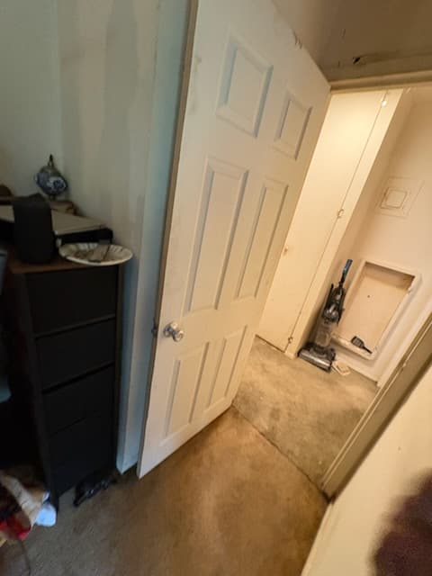 After: the new six-panel closet bifold door hung